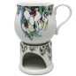 Preview: keramik tasse von 0,4 liter mit stövchen  inhalt verziert mit Orchidee